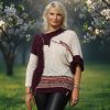 Asymmetrical sleeve knit sweater – playful design