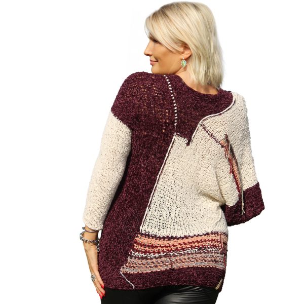 Stylish reversible sweater with daring design and plush texture