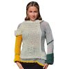 Asymmetric sleeve detail on Artisan Harmony sweater emphasizing sculptural form
