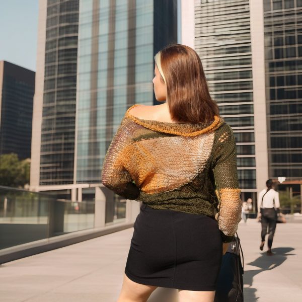 Artistic detail of Autumn Whisper sweater with poetic asymmetry