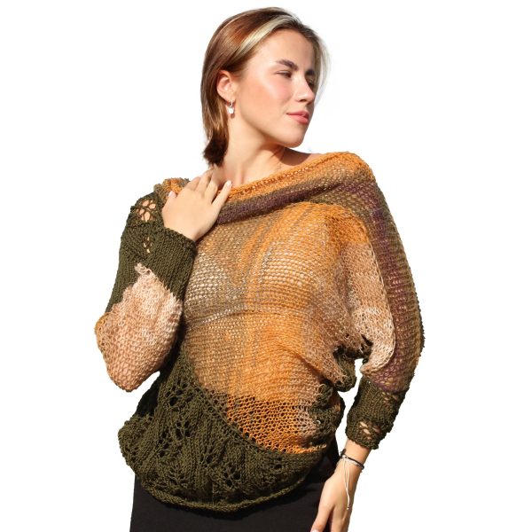 Autumn Whisper knitwear in muted green tones with asymmetric drape