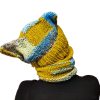 Chaotic Squirrel hat and snood on model, highlighting playful and audacious vibe