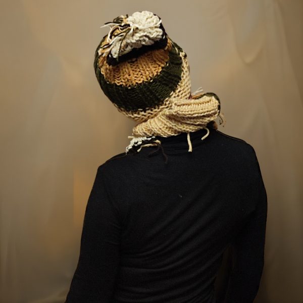 City Nomad hat crowned with lively, sticking-out threads