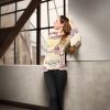 Elegant Burst mid-season sweater with asymmetrical design, soft fabric, and vibrant accents