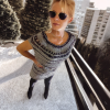 Plum detail on gray knit top with relaxed silhouette