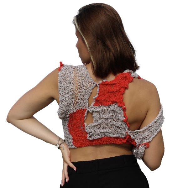 Asymmetrical fire red and gray knit sweater with bold design