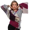 Artistic knitwear with open shoulder design