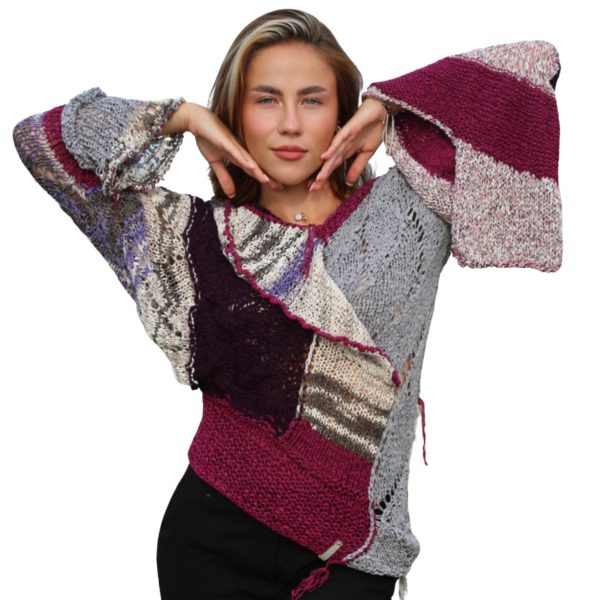 Artistic knitwear with open shoulder design