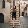 Hooded asymmetric cape in muted dark tones