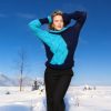 Dark blue knitwear piece with tactile ribbed cuffs and hem accents