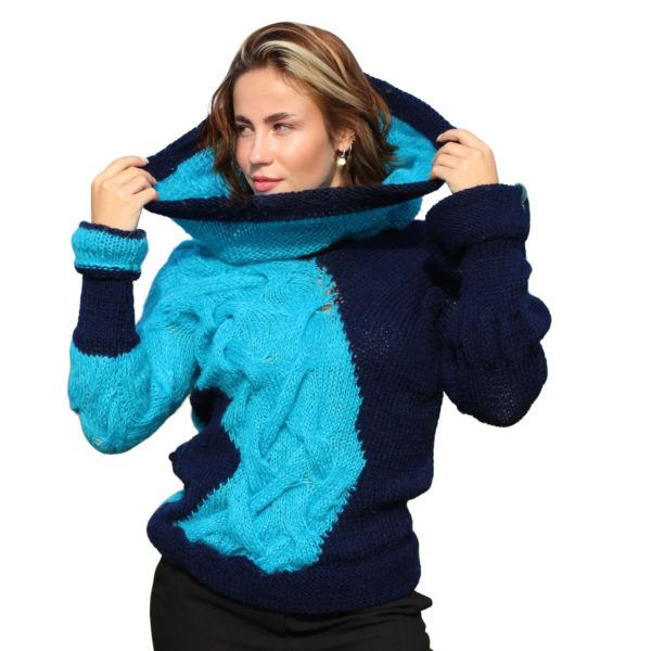 Deep ocean-inspired blue sweater with subtle rebellious design details