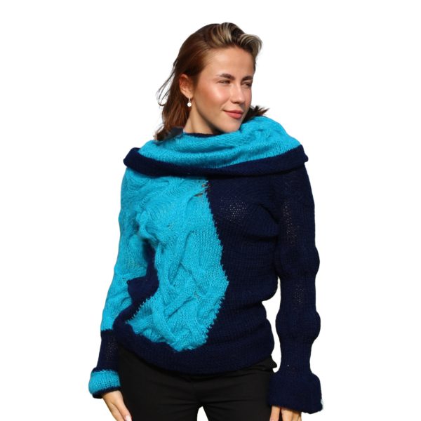 Reversible navy sweater featuring sculptural collar and intricate stitch work