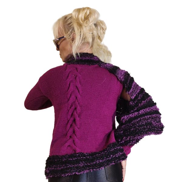Mid-season knitwear in plum and black for striking, confident style.
