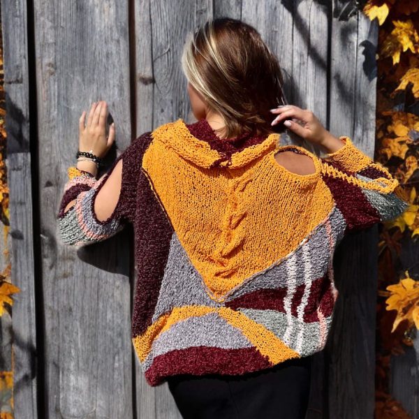 Plush Enigma combining bold stripes and gentle spirals in burgundy, pink, gray, and orange tones.