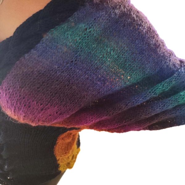 Rainbow Radiance sweater featuring dark navy base, V-neckline, and vibrant mohair gradient from yellow to blue.