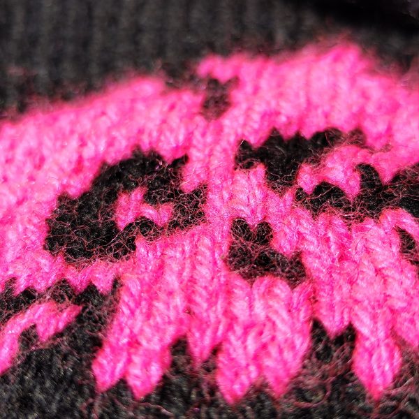 Rebel Elegance cozy and fashionable pet sweater with rear ruffles for energetic cats and dogs