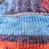 Striped Snuggle Suite colorful pet fashion clothing with artistic stripes, blending comfort and style for small dogs