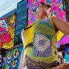 Sunburst Charm elongated top in bright patchwork of yellow, black, green, pink, white, sky-blue, handmade, playful, breathable