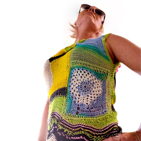 Sunburst Charm vibrant elongated top, geometric patterns, cheerful and airy, handcrafted uniqueness