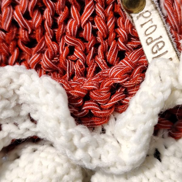 Tiny Tornado sweater for dogs and cats, playful frills and bow, muted red with white accents, cozy and stylish