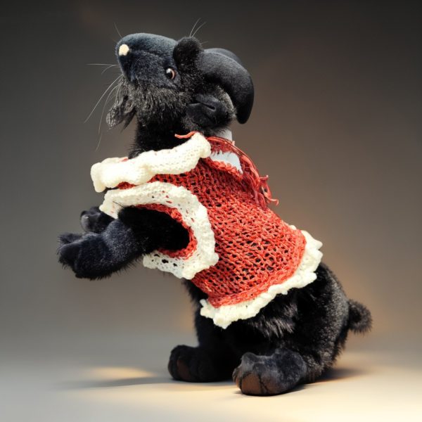 Tiny Tornado pet sweater, snug fit, red base with white ruffles and decorative bow, comfortable and playful