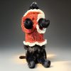 Tiny Tornado pet sweater, red with white accents, playful frills on legs, cozy and bold personality