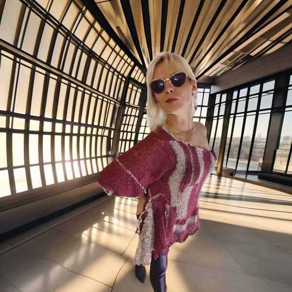 Asymmetrical burgundy tunic with a ruffle and unmistakable character